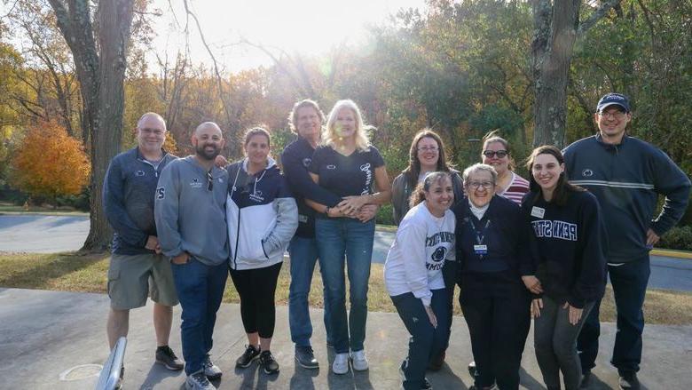 alumni posing for photo